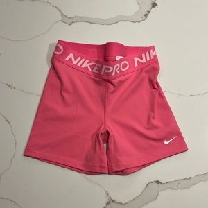 pink Nike pros in size medium